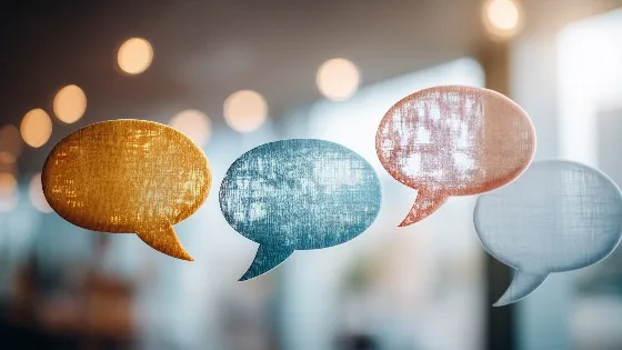 stylized word balloons hang in midair, as if in conversation